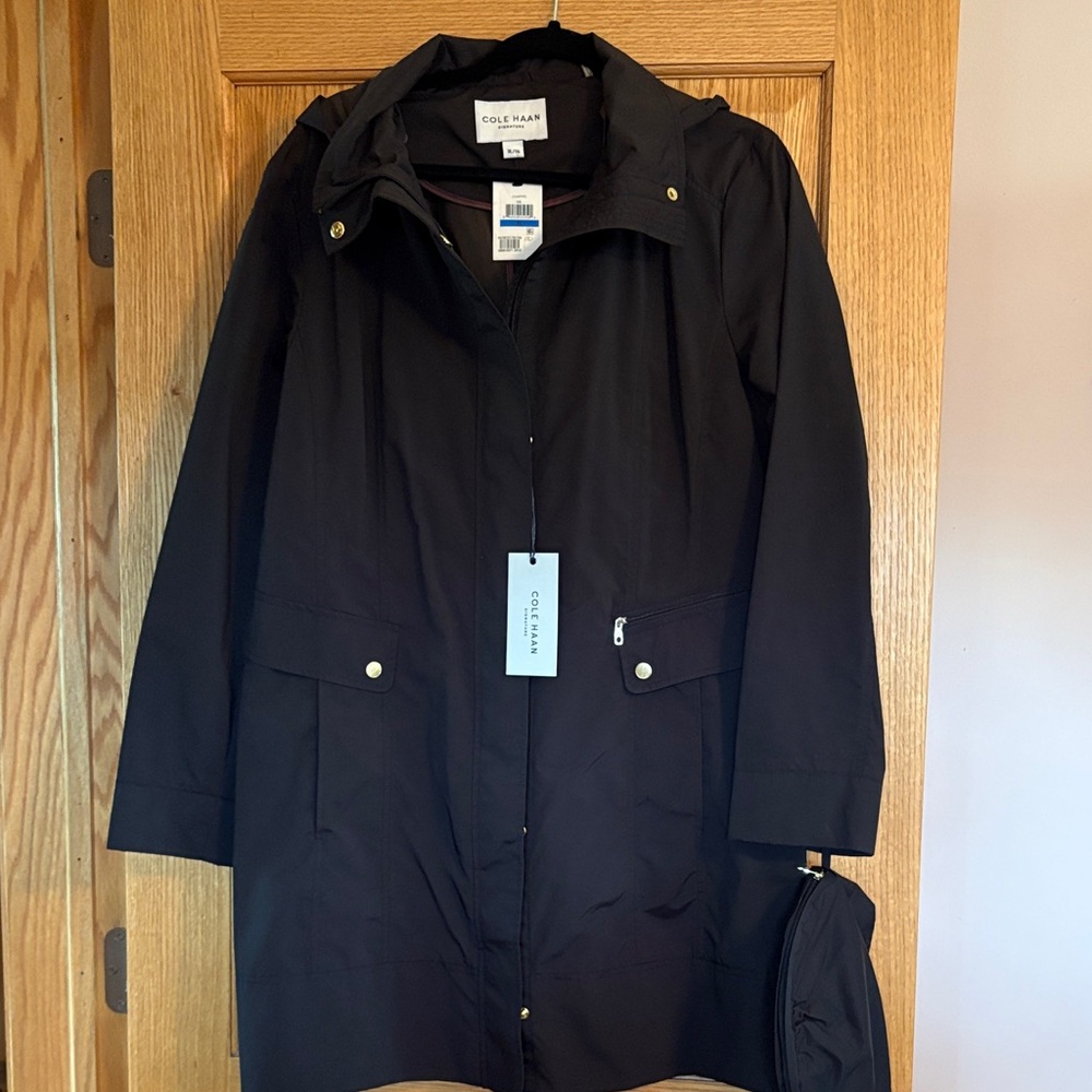 Cole Haan Women's Dark Trench Coat with Hood.  Pack able with pouch.